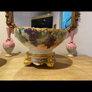 Handed paint bowl with matching base.